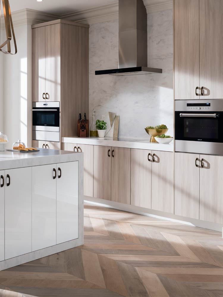 kiba studios neutral cabinets and herringbone flooring